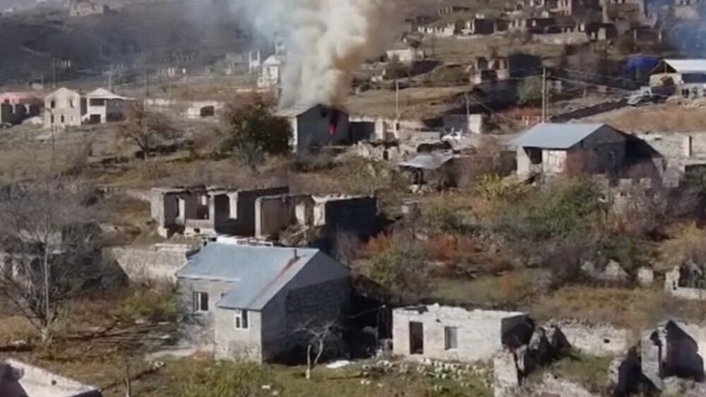 Armenians flee village as Azeris take control