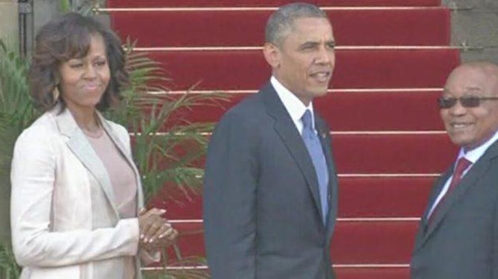 Video: Obama meets with Mandela family, praises former leader