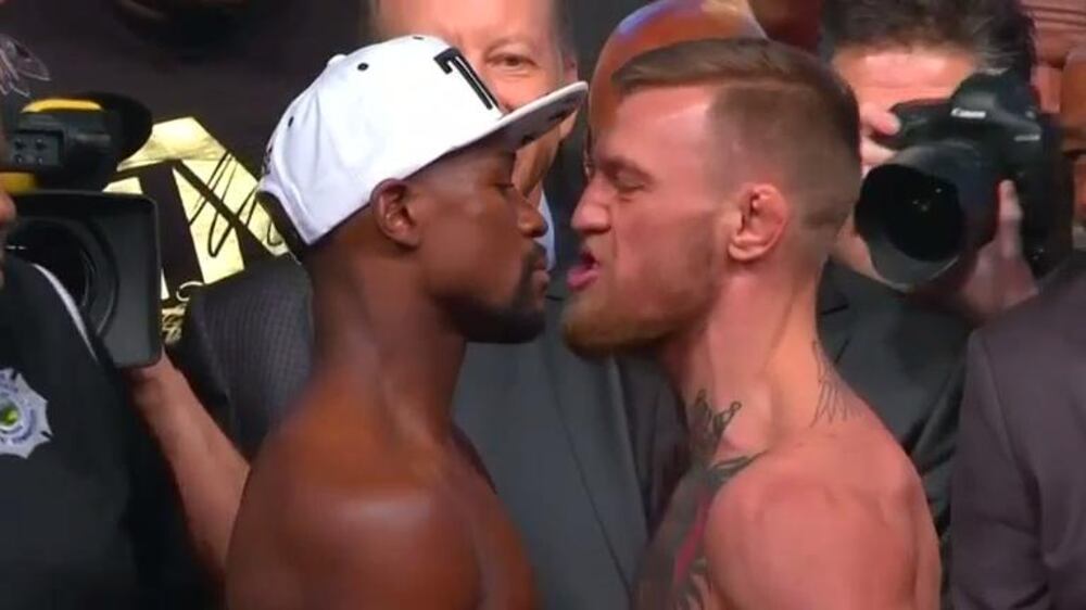 Mayweather and McGregor go face-to-face at weigh-in