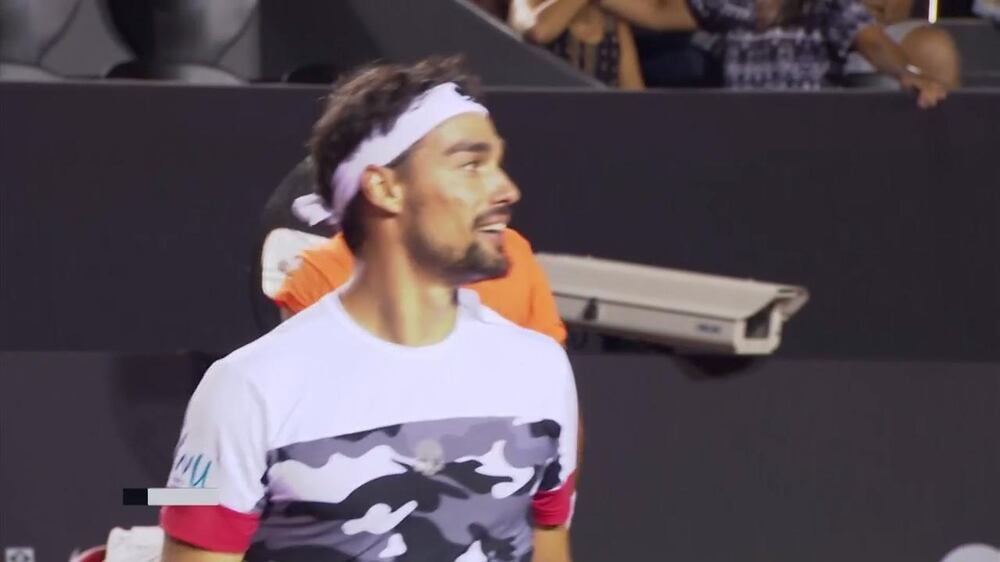Fognini drops racquet, picks it up on a bounce then wins a set point in win over Bellucci at Rio Open