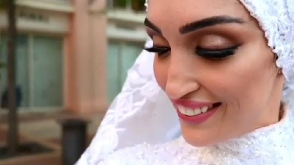 Moment Lebanese bride posing for photos is blown over by blast