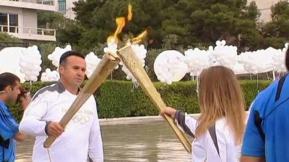 Video: Olympic flame passed onto UK on way to London