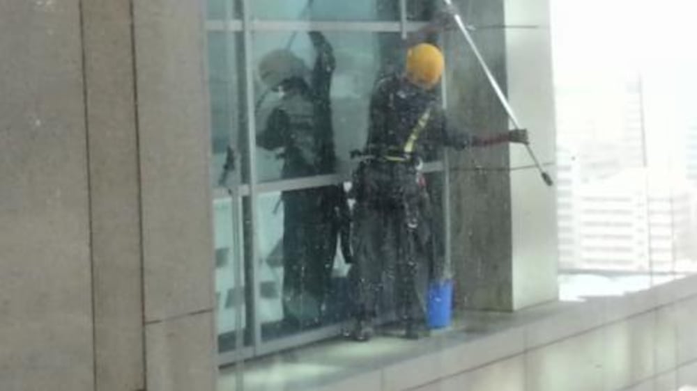Video:  Window cleaners filmed breaking safety rules