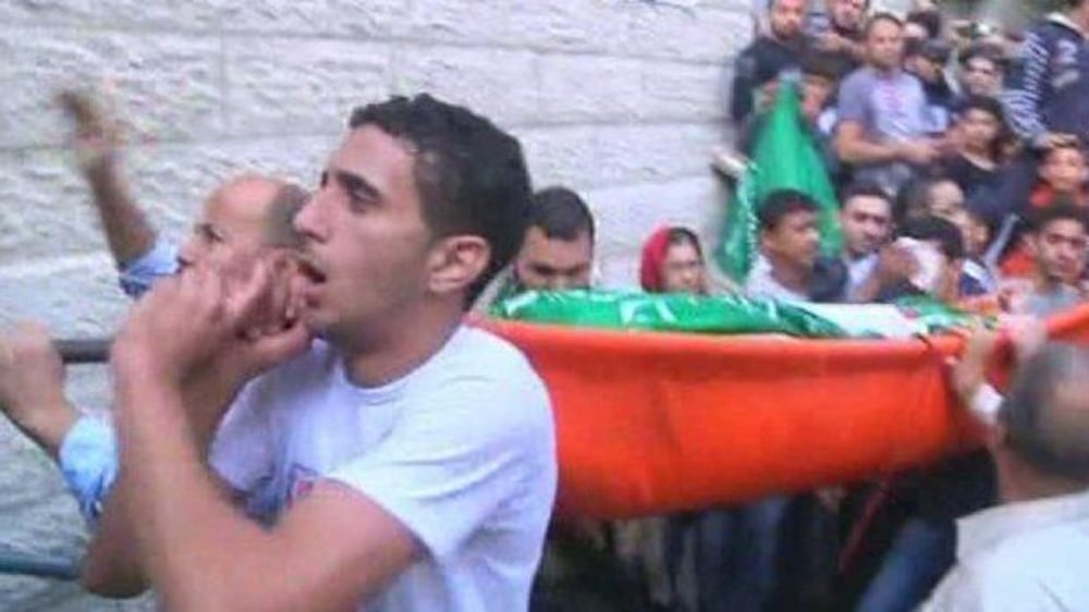 Video: Gazans mourn dead as Israelis praise 'Iron Dome'