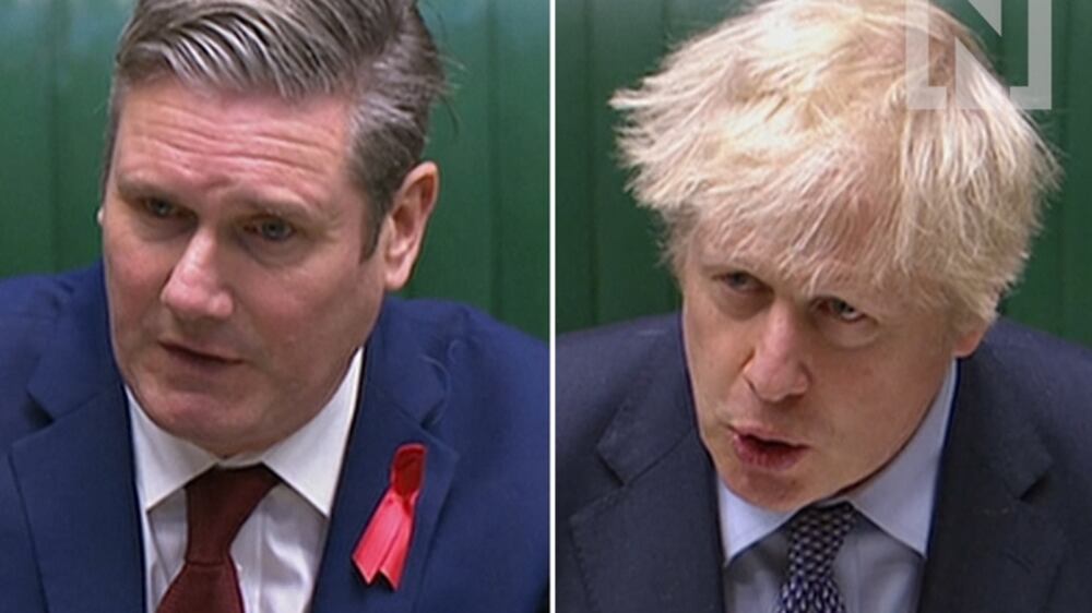 Johnson and Starmer clash as MPs back tougher tier systems