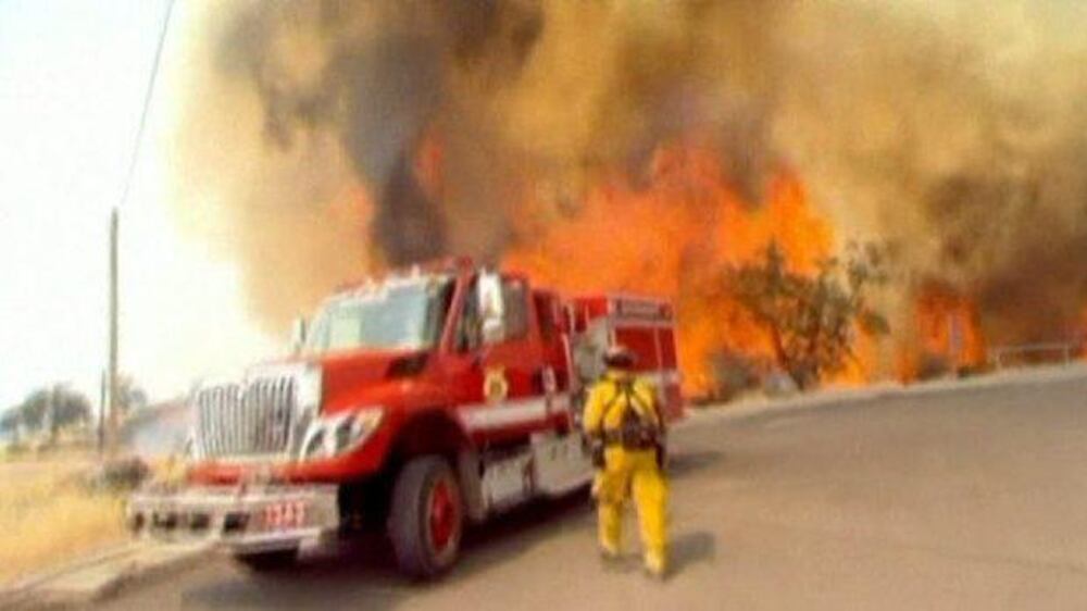 Video: Wildfires rage across California