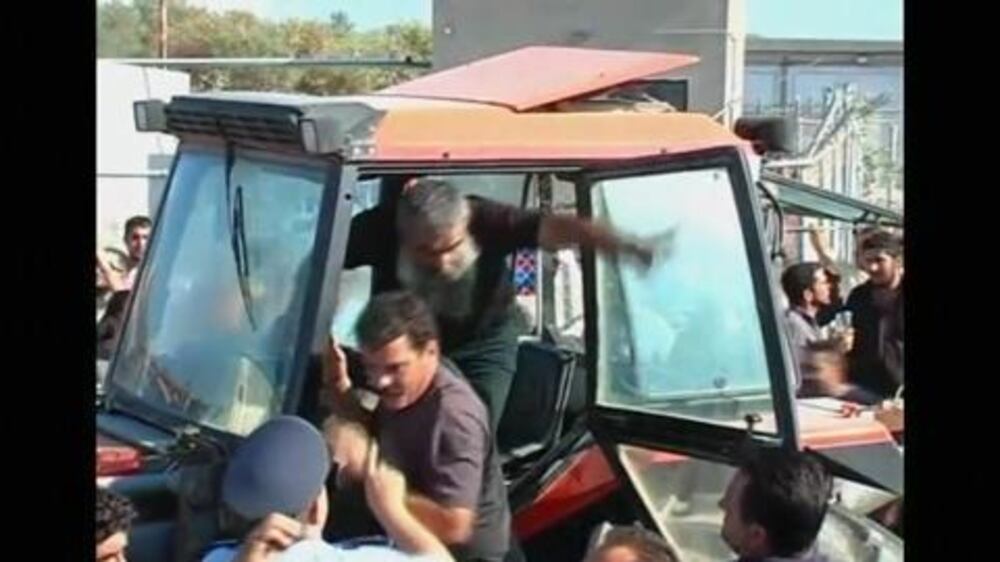 Video: Greek farmers blockade airport with tractors