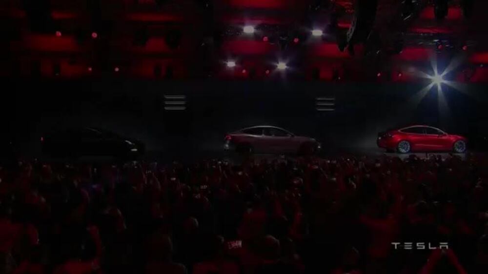 Tesla unveils electric lorry and new Roadster