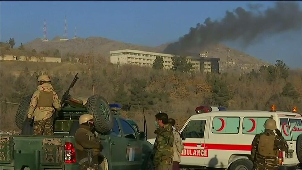 Several dead in Kabul as gunmen attack top hotel