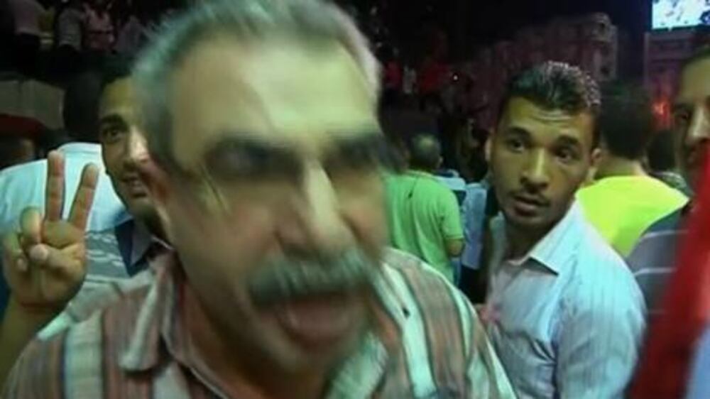 Video: Cheers, fireworks in Tahrir Square after Mursi announcement