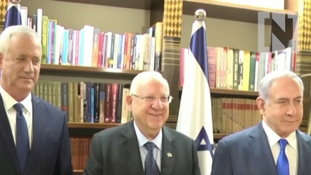 Israeli leaders agree to power-sharing deal