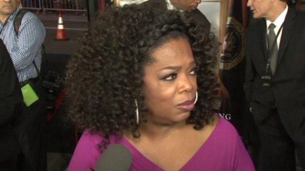 Video: Oprah opens the 'handbag' issue at 'The Butler' premiere