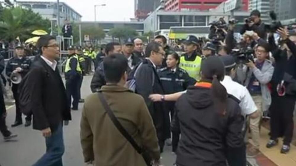 Hong Kong protesters vow to continue movement after police release organisers - video