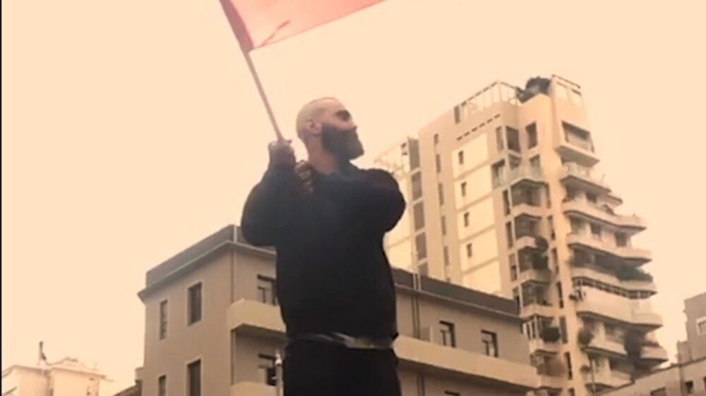 Lebanese protester keeps bullet scar as symbol of hope