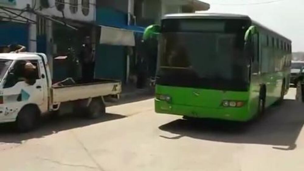 Video: Rebels evacuated from Homs, cradle of Syrian uprising