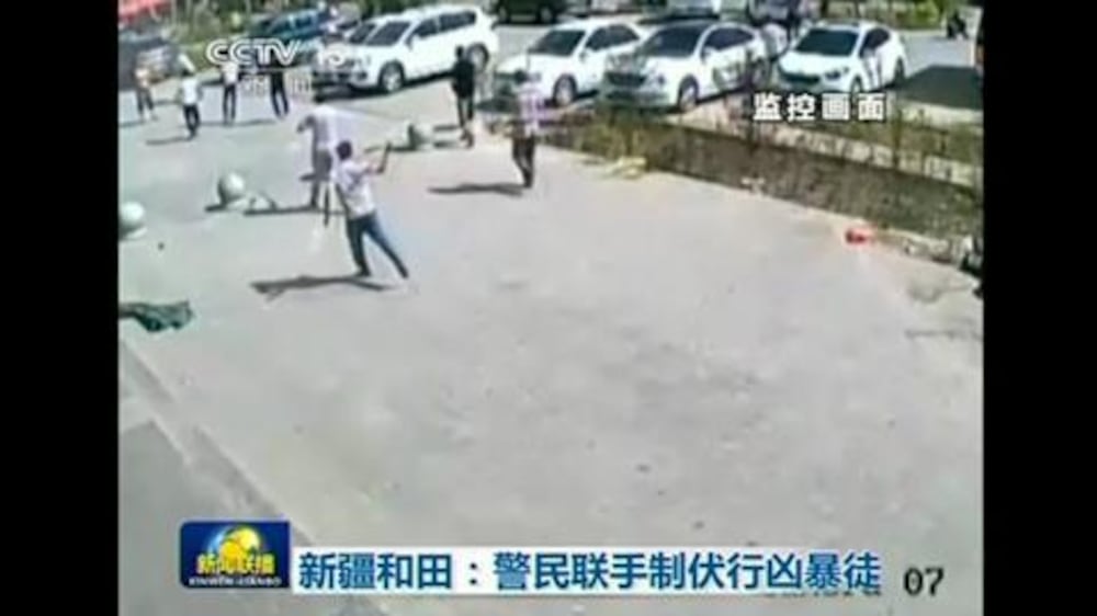 Video: Four injured in axe-wielding attack at chess hall in China