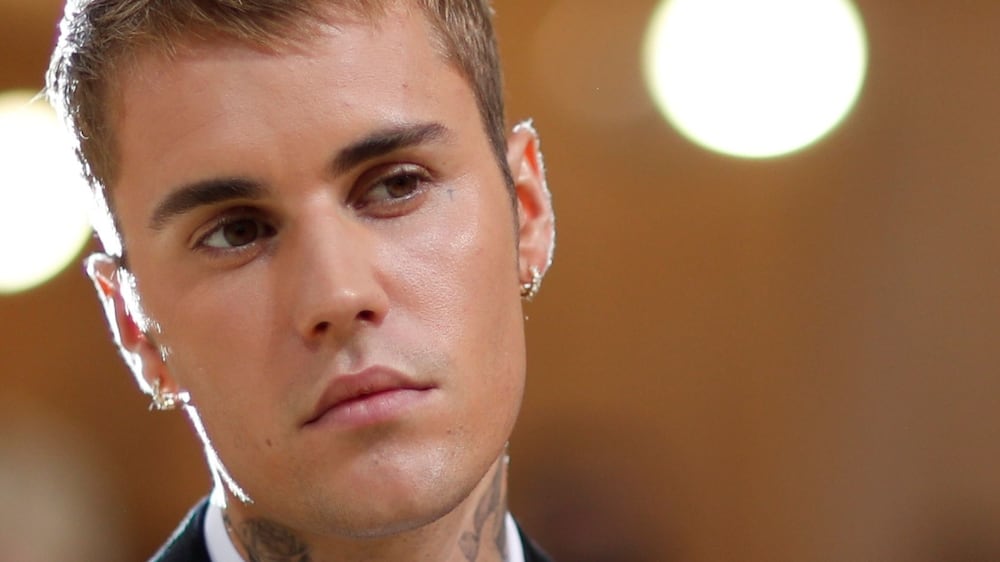 Justin Bieber reveals he has been diagnosed with a virus that left half of his face paralysed