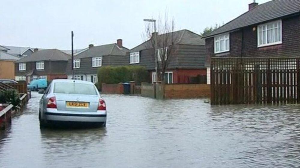Video: Cameron sees damage of UK flooding first hand