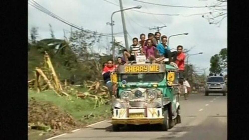 Video: Typhoon survivors flee villages in panic
