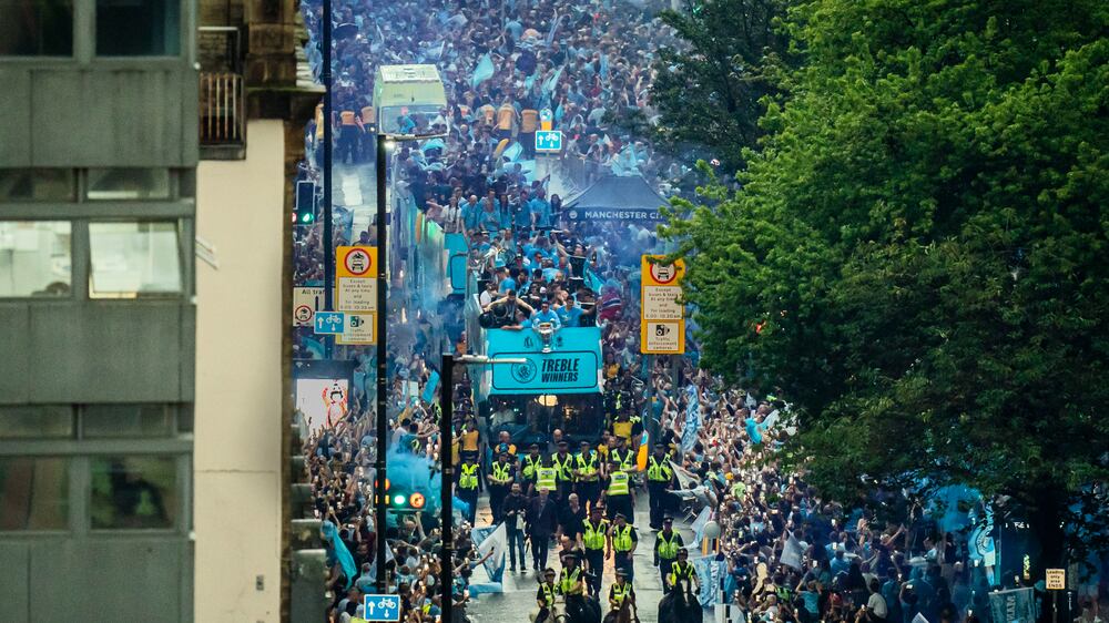 Manchester City celebrate their treble success with victory parade