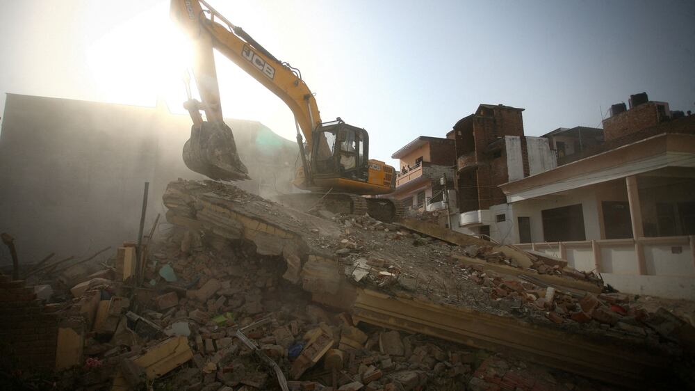 India demolishes homes of protesters amid religious tension