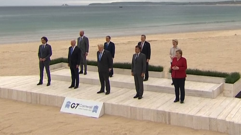 G7 leaders pose on Cornish beach before summit