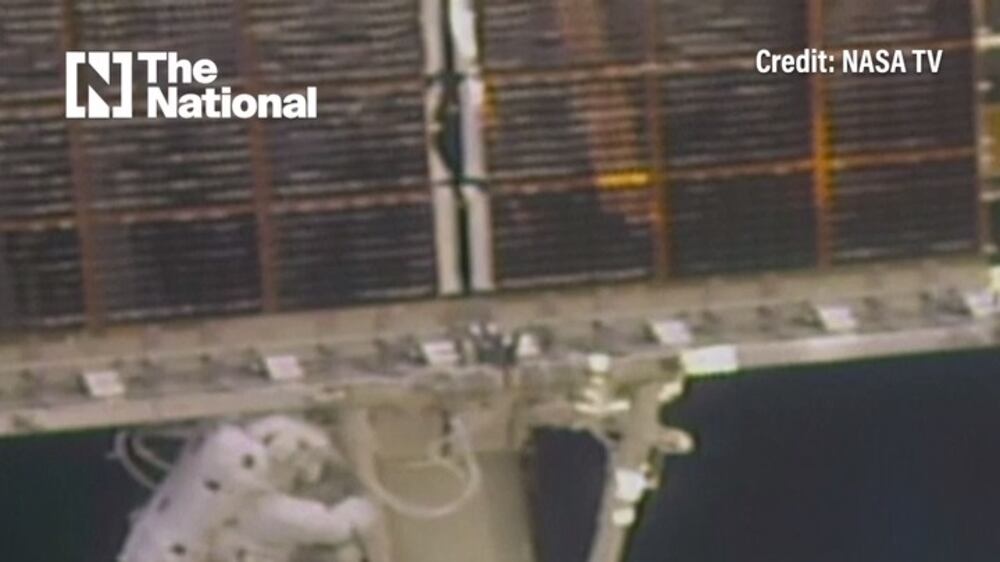 Spacewalking astronauts equip ISS with new solar panels