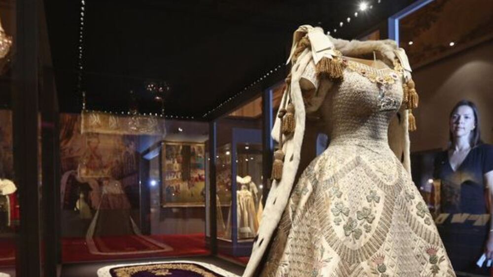The Queen's coronation gown and the Robe of the Estate, on display at Buckingham Palace in 2013. Photo The Royal Collections