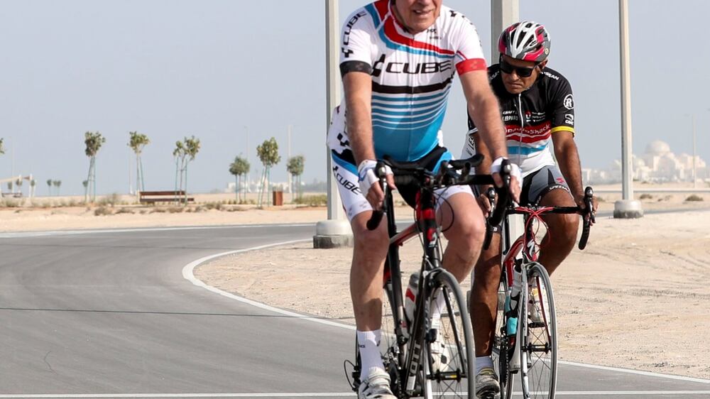 Dr. Essam Eldin Al Shammaa, 81, meets his friends, a group of doctors every Friday morning to cycle together at the cycling track on Al Hudayriat Island. 
