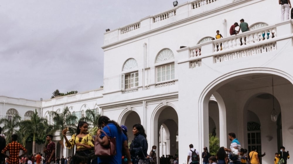 Sri Lankans use facilities in president's palace after it was stormed
