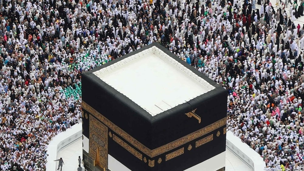 Worshippers perform the farewell tawaf (circumambulation) in the holy Saudi city of Mecca on July 11, 2022, marking the end of this year's Hajj.  (Photo by AFP)