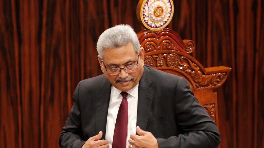 FILE - Sri Lankan President Gotabaya Rajapaksa leaves after addressing parliament during the ceremonial inauguration of the session, in Colombo, Sri Lanka on Jan.  3, 2020.  The president of Sri Lanka fled the country early Wednesday, July 13, 2022, days after protesters stormed his home and office and the official residence of his prime minister amid a three-month economic crisis that triggered severe shortages of food and fuel. (AP Photo / Eranga Jayawardena, File)