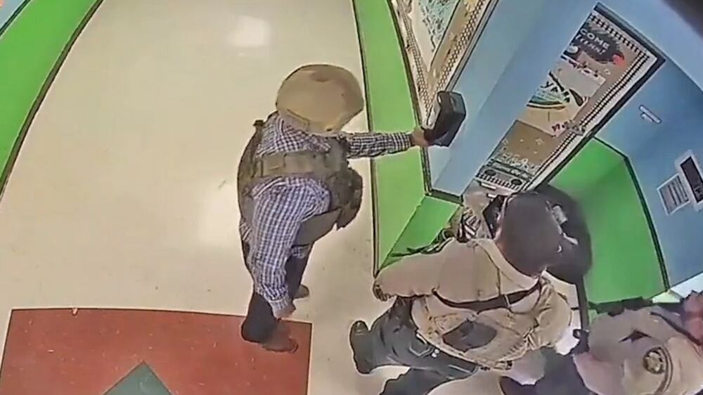 Police officer filmed sanitising hands during Uvalde school shooting