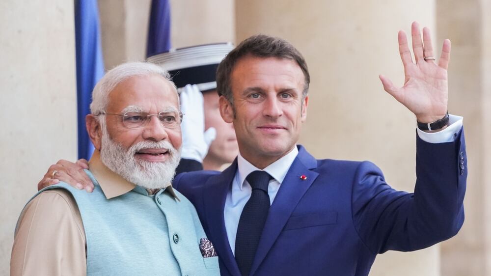 French President Emmanuel Macron welcomes Indian PM Narendra Modi