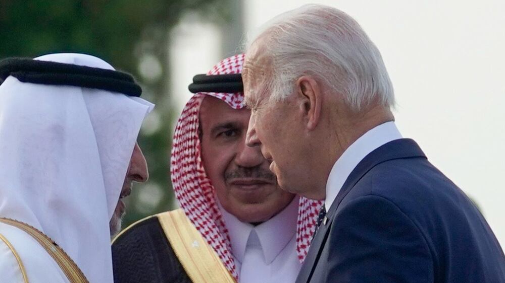 President Joe Biden is greeted by officials as he arrives at King Abdulaziz International Airport, Friday, July 15, 2022, in Jeddah, Saudi Arabia.  (AP Photo / Evan Vucci)