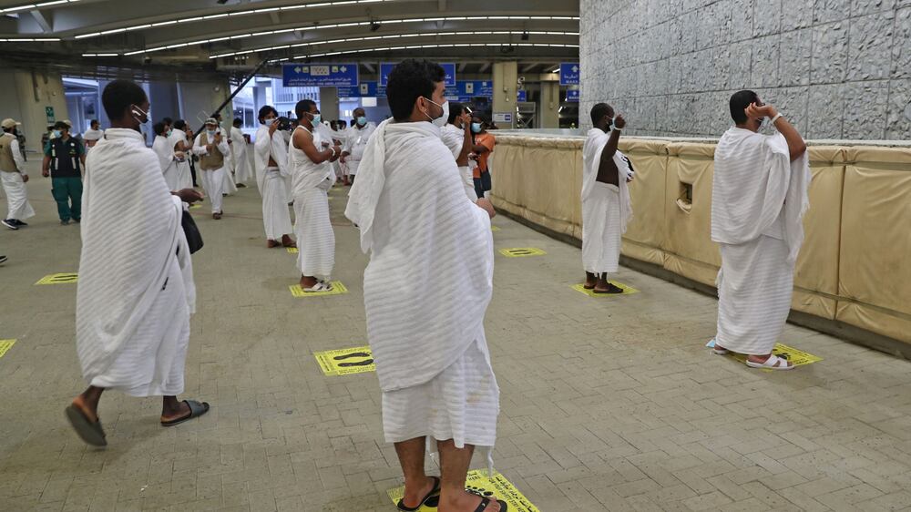 Hajj pilgrims perform the stoning ritual at Jamrat Al Aqabah