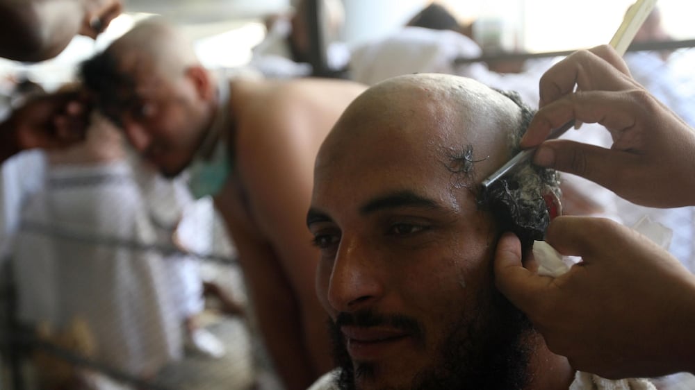 Hajj pilgrims shave their heads after stoning ritual