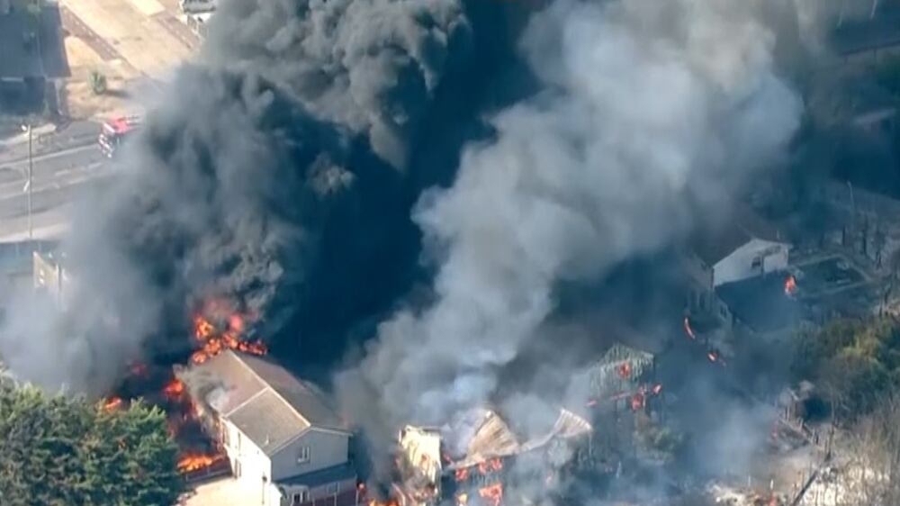 Fires tear through London destroying houses on hottest day