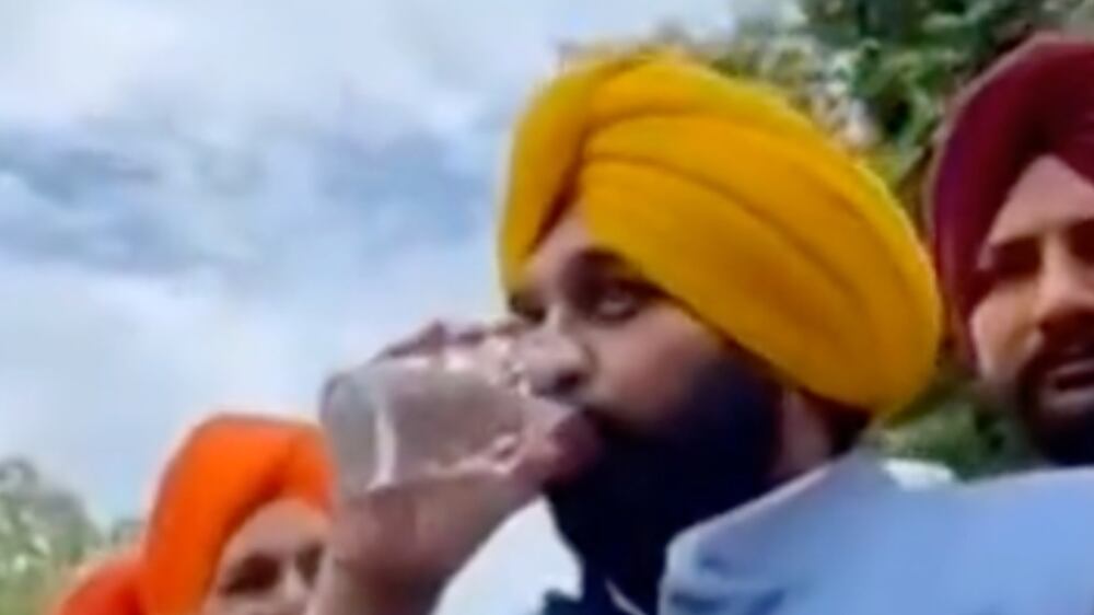 Watch: Indian politician drinks holy water to prove it is clean, later hospitalised