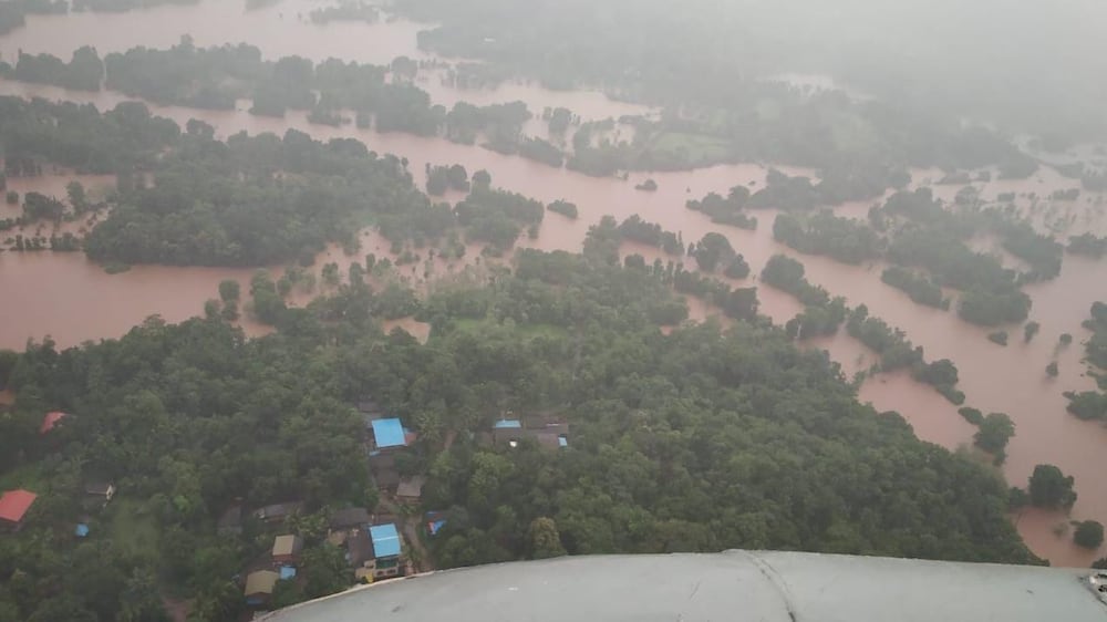 Rescues under way in western India after rains cause flooding and landslides