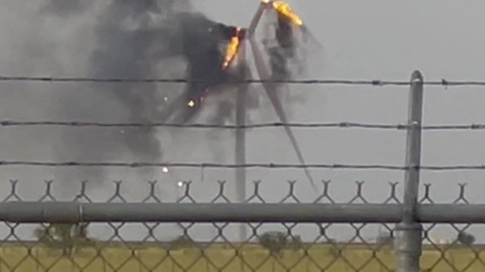 Smoke rises from a wind turbine after it caught fire due to lightning, in Crowell, Texas, U. S. , July 22, 2022, in this screen grab taken from a social media video.  Brent Havins/via REUTERS   ATTENTION EDITORS-  THIS IMAGE HAS BEEN SUPPLIED BY A THIRD PARTY.  MANDATORY CREDIT.  NO RESALES.  NO ARCHIVES. 