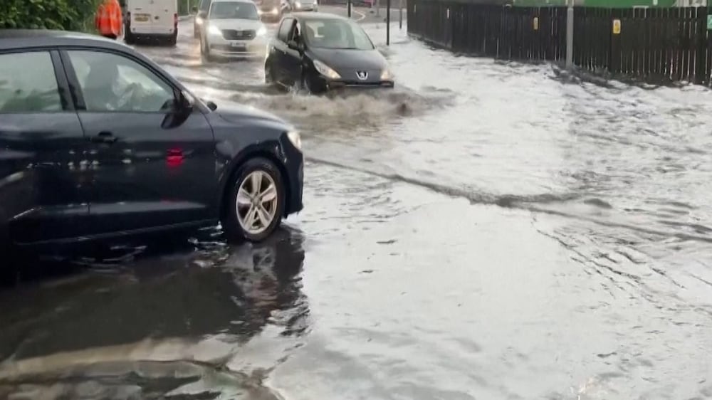 London thunderstorms leave streets and Tube stations flooded