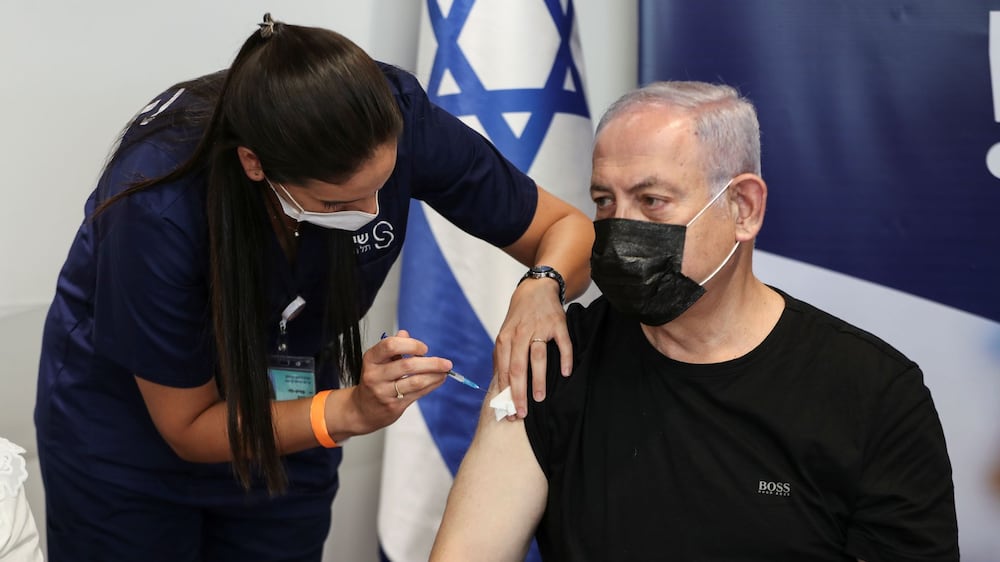 Netanyahu receives third Covid-19 shot as booster offered to over-60s