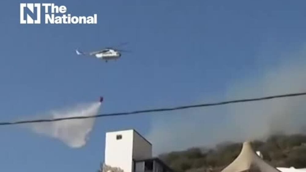 Helicopters dump water over Turkey's raging wildfires