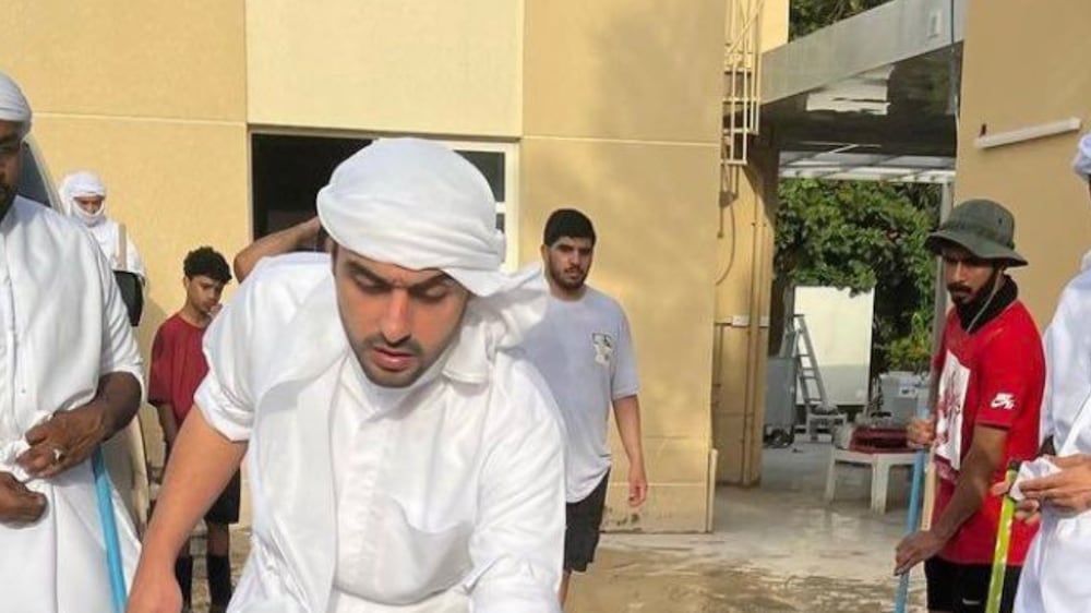 Watch: Fujairah ruling family member joins clean-up drive after floods