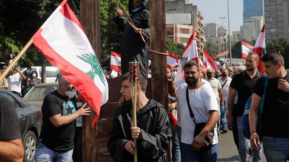 Thousands of people flood streets of Beirut to honour those who lost their lives in August 4 blast