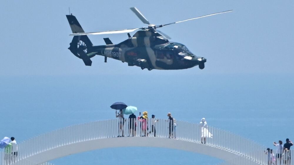 Chinese military helicopters fly near Taiwan Strait