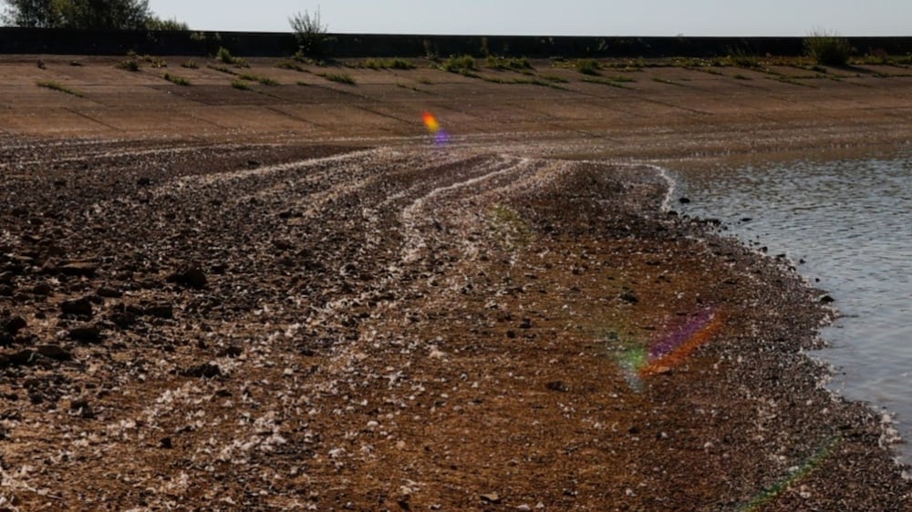 The exposed bed of the Arlington Reservoir, operated by South East Water Ltd. , near Polegate, UK, on Friday, Aug.  12, 2022.  Extreme heat and dry weather are putting intense pressure on England's water supply. Photographer: Carlos Jasso  / Bloomberg