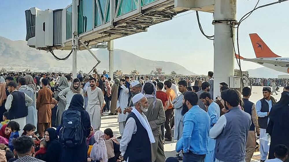 Chaos at Kabul airport as hundreds try to flee Afghanistan