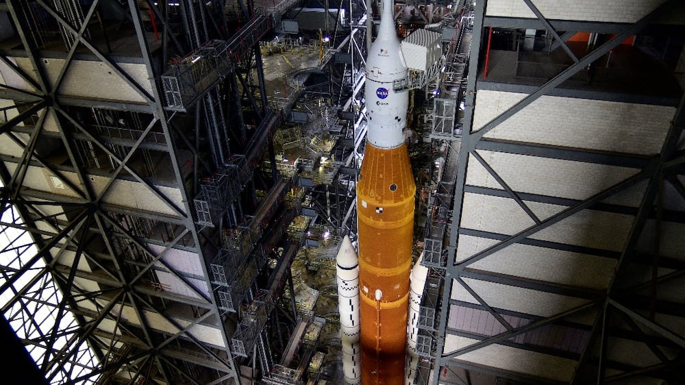 NASA's next-generation moon rocket, the Space Launch System (SLS) Artemis 1 rocket with its Orion crew capsule begins its roll to launch pad 39B at the Kennedy Space Center in Cape Canaveral, Florida, U. S.  August 16, 2022.  REUTERS / Steve Nesius